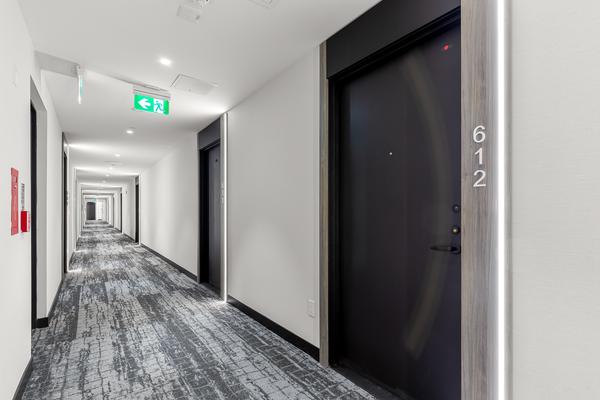Bright building corridor and suite entrance at Brightwater II Port Credit Mississauga