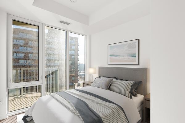 Virtually staged Primary bedroom with walk-in closet and ensuite at Brightwater II Port Credit
