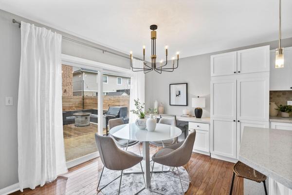 Sun-drenched eat in kitchen and chef's desk perfect for working from home at 1537 Morse Place Milton