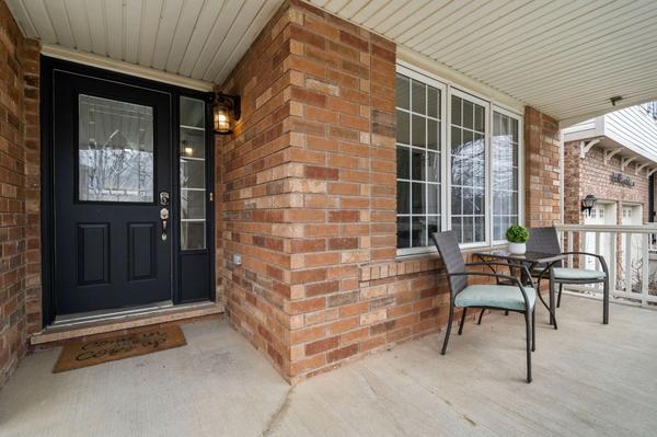 Welcoming front porch at 1537 Morse Place Milton wide enough for seating and conversation