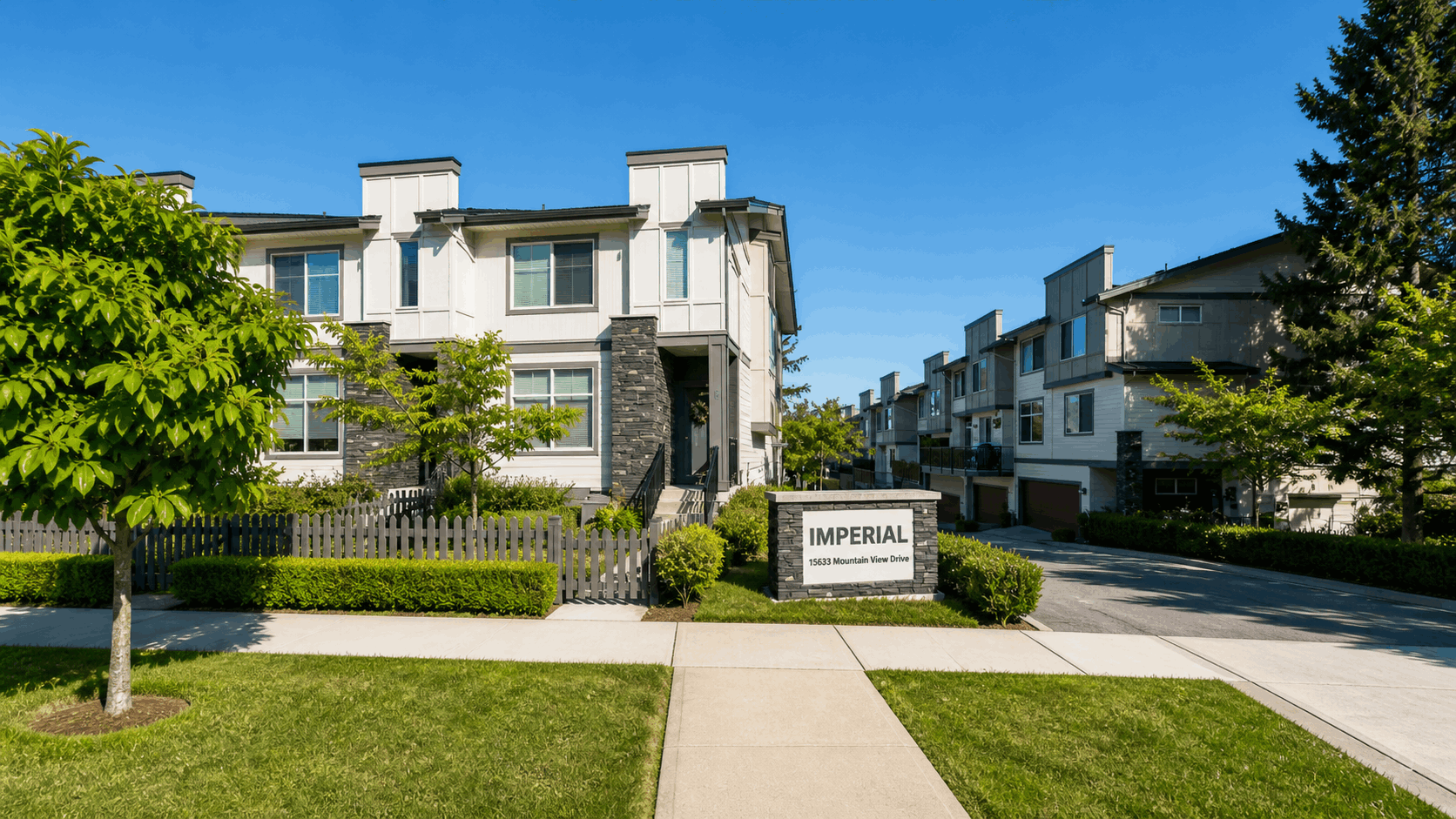 Imperial townhomes entrance at 15633 Mountain View Drive in South Surrey Grandview area with landscaped walkway and modern townhouse buildings
