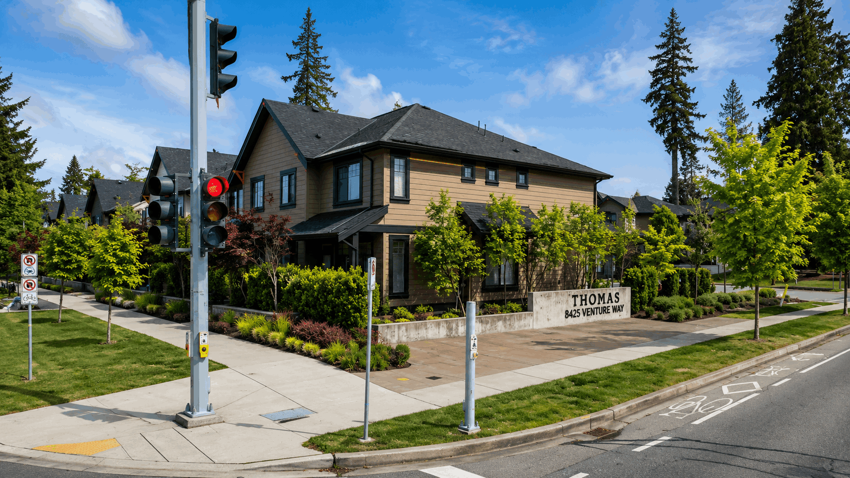 Thomas at Fleetwood townhomes for sale at 8425 Venture Way Surrey BC, exterior view of the townhouse complex with landscaped grounds, private homes, and Fleetwood community streetscape.