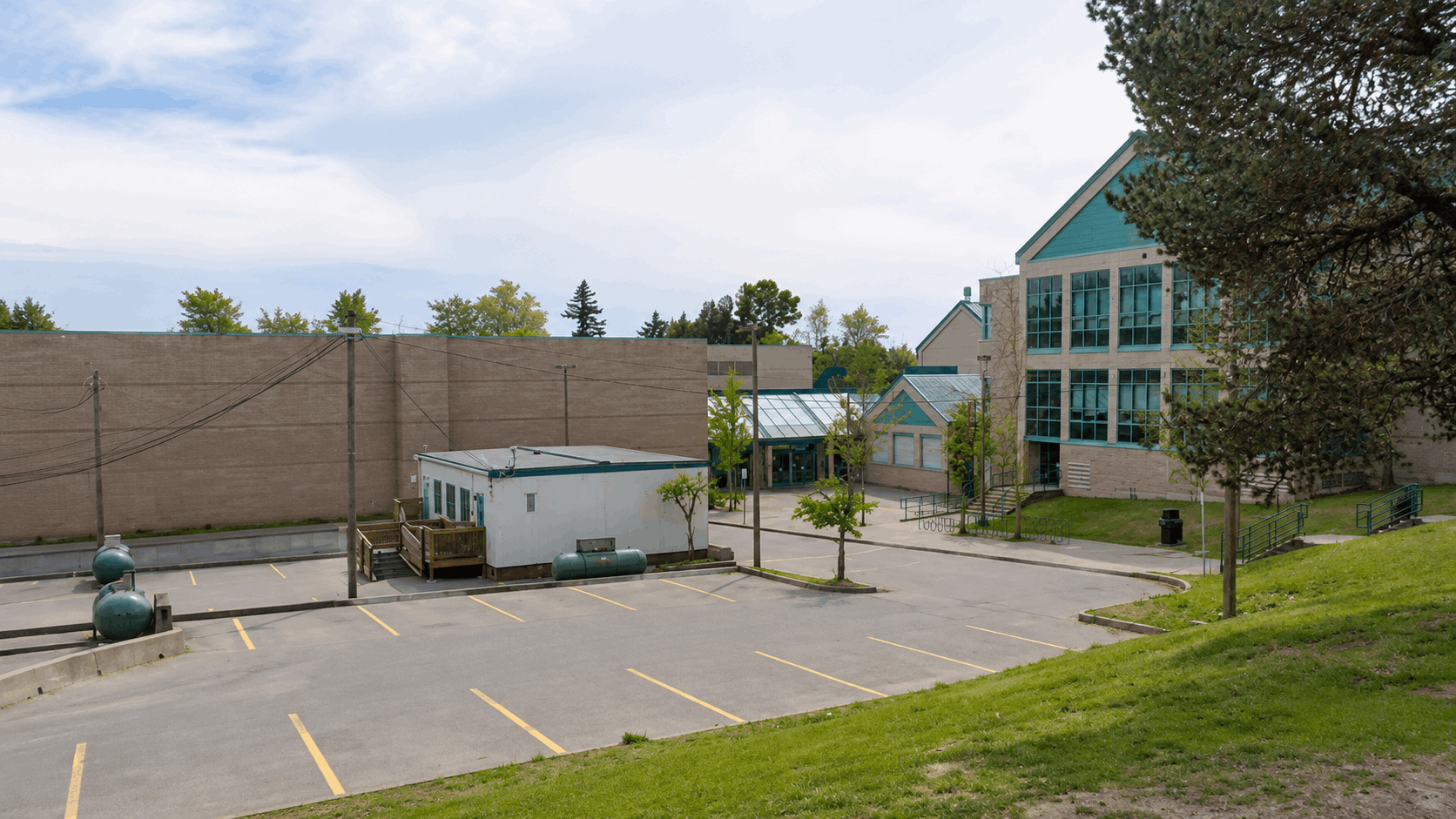 Fleetwood Park Secondary School in Surrey BC, showing the school campus, parking area, school buildings, and grounds serving students in the Fleetwood neighbourhood near Thomas at Fleetwood townhomes.