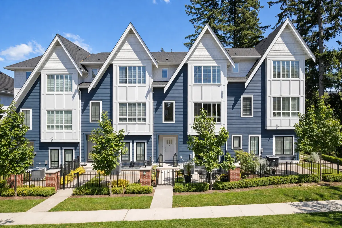 Modern Hyde Park suburban townhomes on a sunny day in South Surrey Grandview