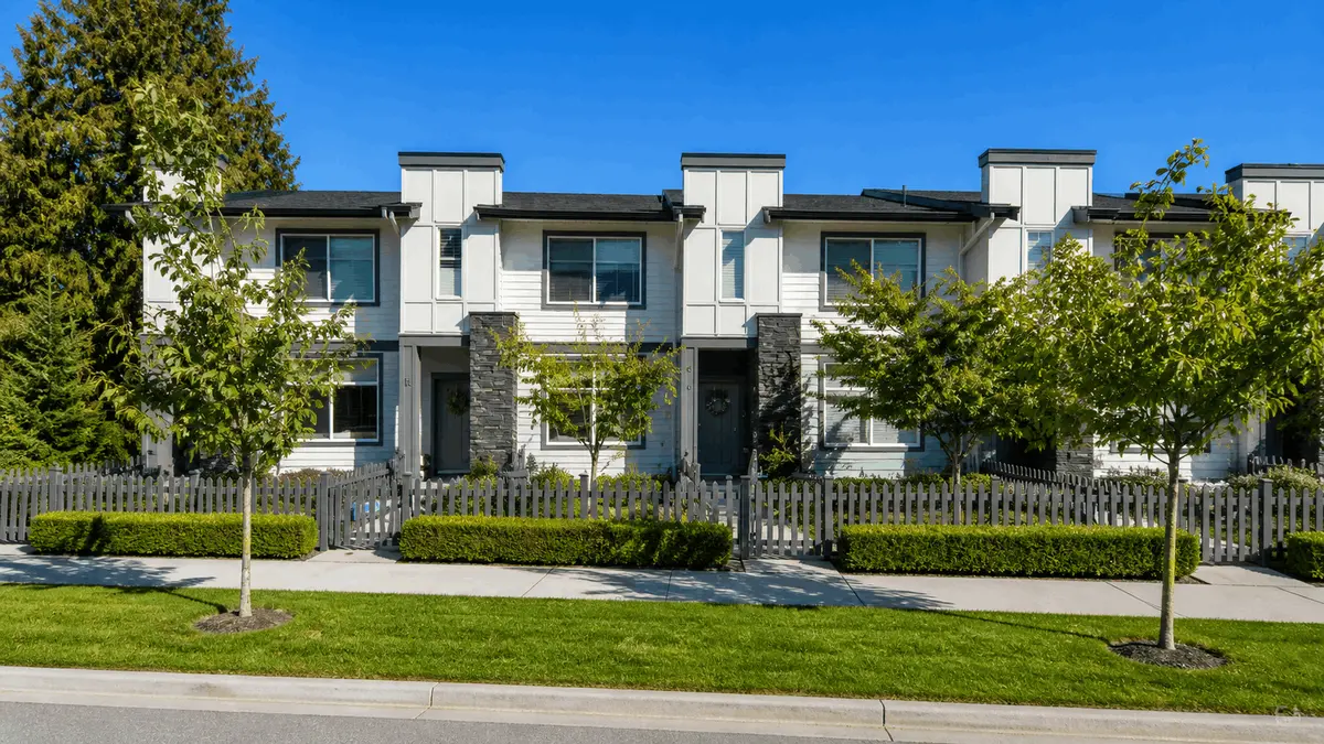 Imperial townhomes at 15633 Mountain View Drive South Surrey street view with green landscaping and modern townhouse exteriors