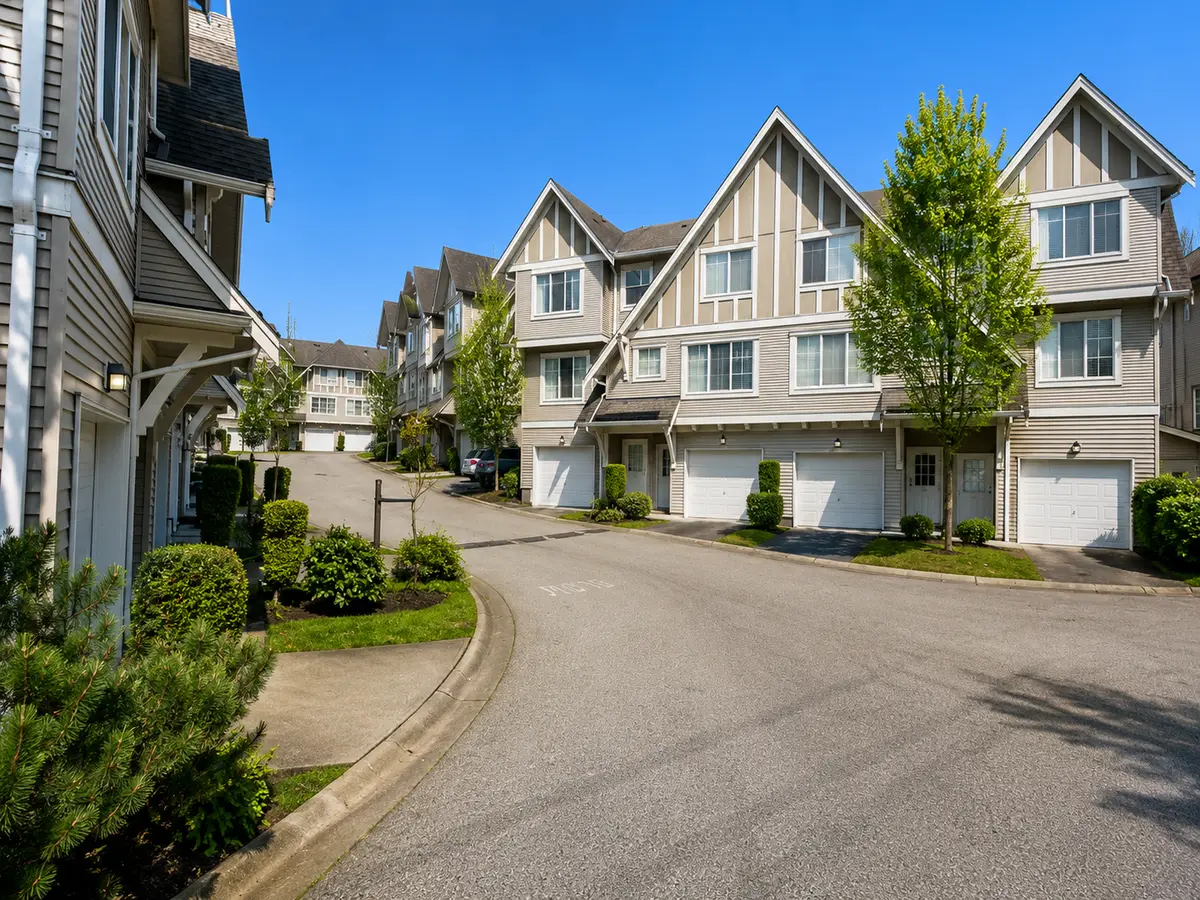 Internal roadway at Brooklands townhomes located at 15175 62A Avenue in Sullivan Station, Surrey BC, showcasing three-level Polygon-built townhomes, landscaped streets, attached garages and the well-maintained residential community.