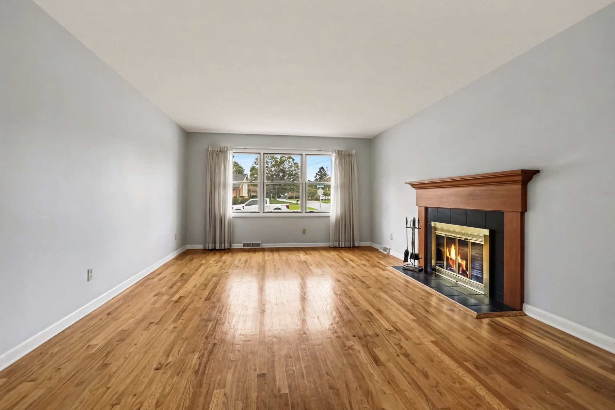 Living room with fireplace and hardwood floors