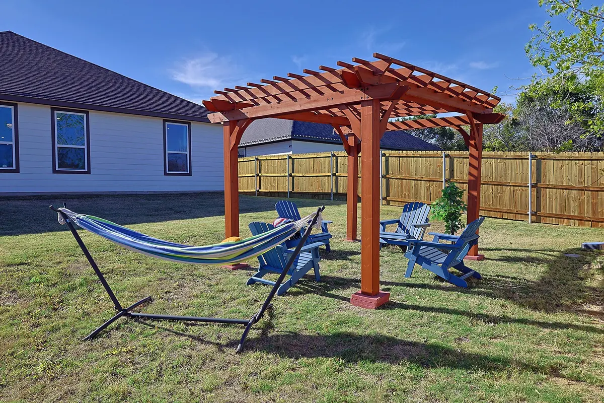 Sunrise view and outdoor living shown here with pergola and hammock ready for relaxing
