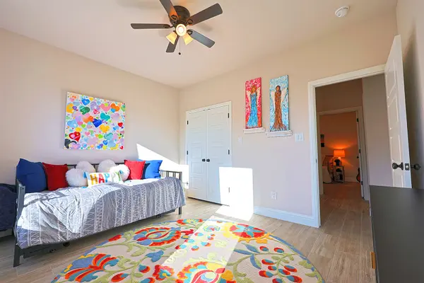 Front Bedroom with plenty of space and a large closet