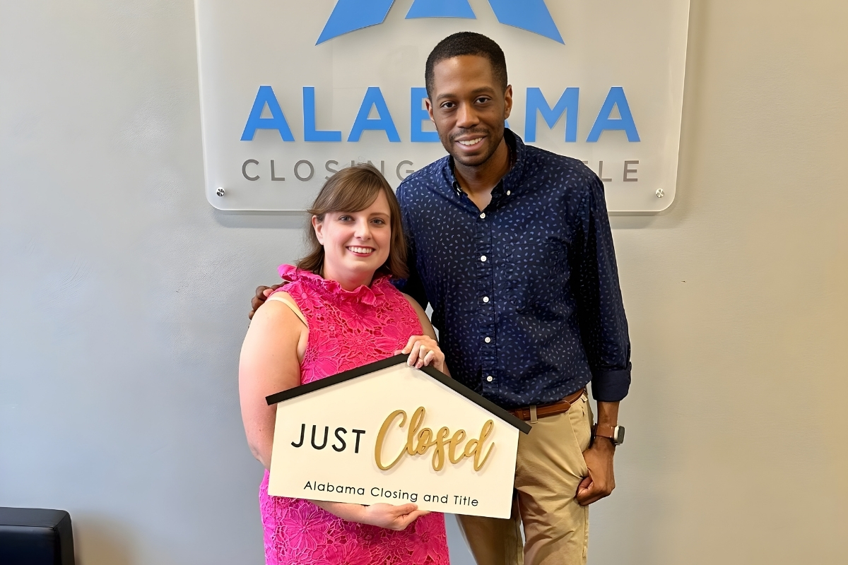 Tavarus McCrary congratulates Alyssa on closing her new townhouse in Huntsville, Alabama.