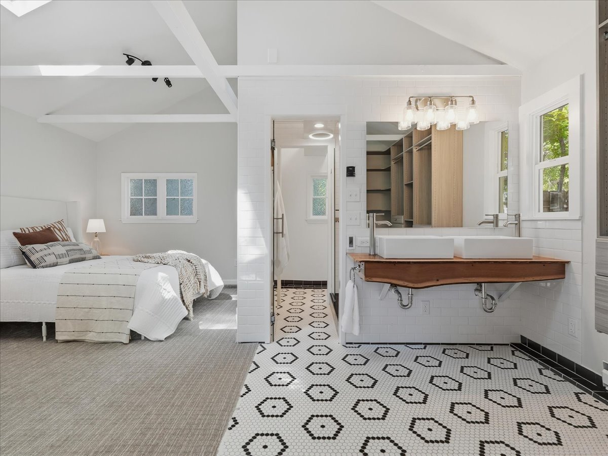 Vaulted primary suite with custom closet at 1726 W Mulberry Fort Collins