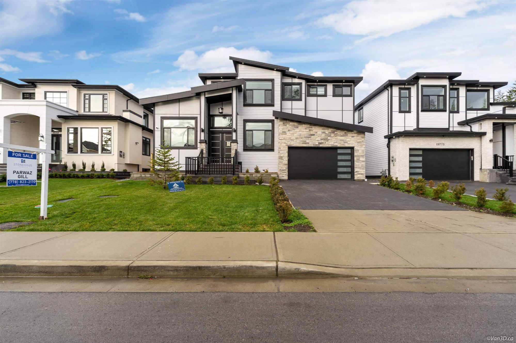 A young family touring a home for sale in Surrey with their Realtor