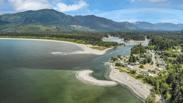Honeymoon Bay on the south shore of Cowichan Lake, village and forested shoreline