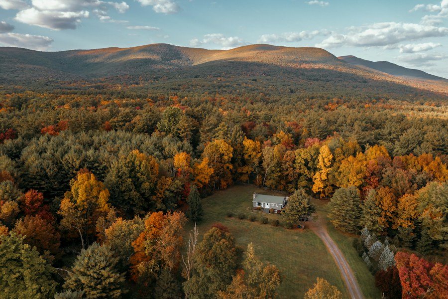 A house among autumn trees in the Hudson Valley