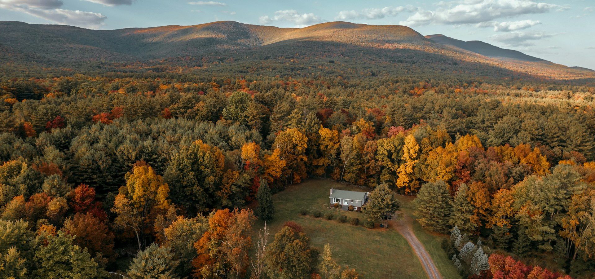 A house among autumn trees in the Hudson Valley