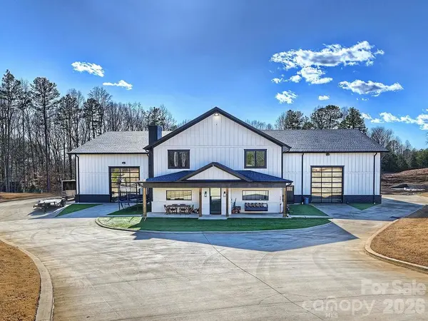 feature image of Experience Ultimate Privacy and Adventure at This Cleveland, NC Luxury Barndominium Estate Featuring 3 Bedrooms, 2 Baths, and Nearly 15,000 Sq Ft of High-Performance Living on 14 Scenic Acres, Complet