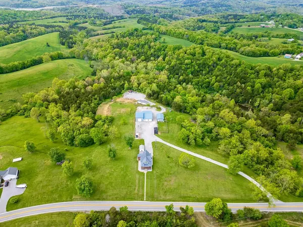 Butler, KY Modern Farmhouse Mini Farm Retreat on Nearly 14 Acres – Featuring 3 Bedrooms and 2 Baths, Renovated Craftsman with Massive Heated Barn Garage for 6+ Vehicles, Big Toys & Projects, Offering 
