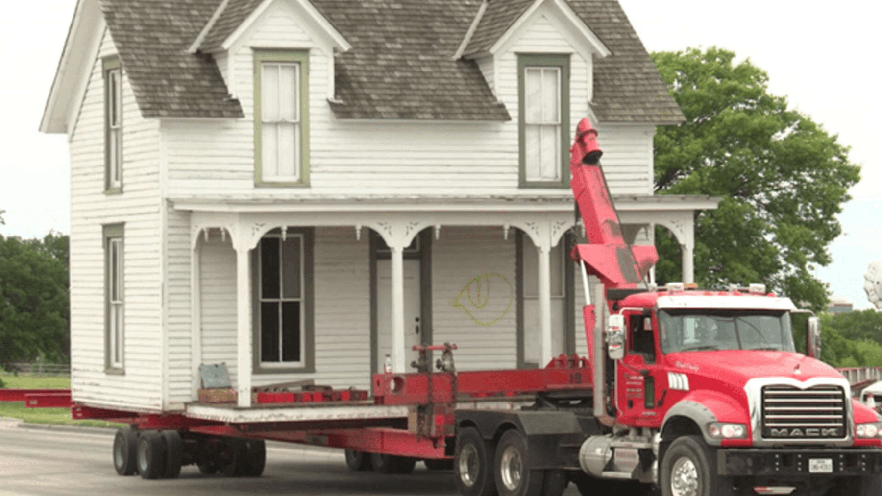 Historic Miss Belle’s House being moved down Plano Road to its new home at Huffhines Park in Richardson, Texas