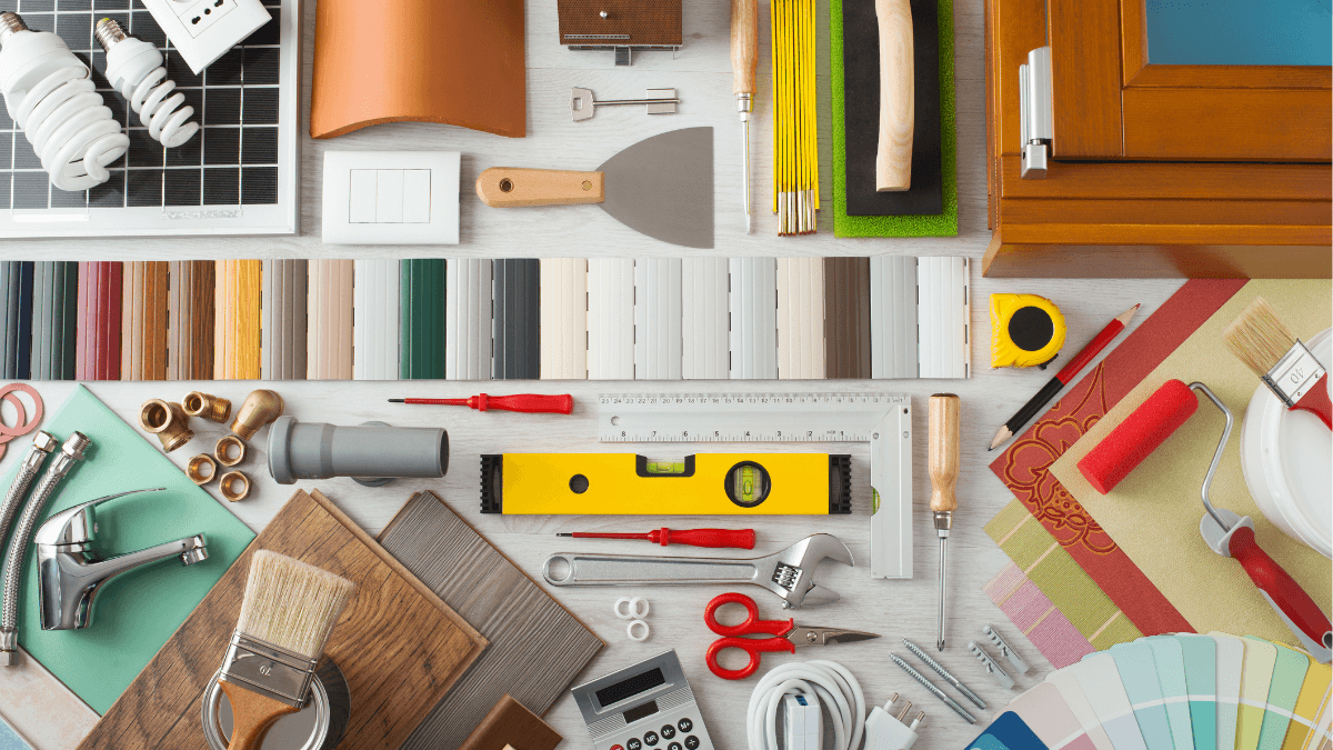 Home renovation tools, paint samples and materials illustrating strategic updates before selling a Dallas home
