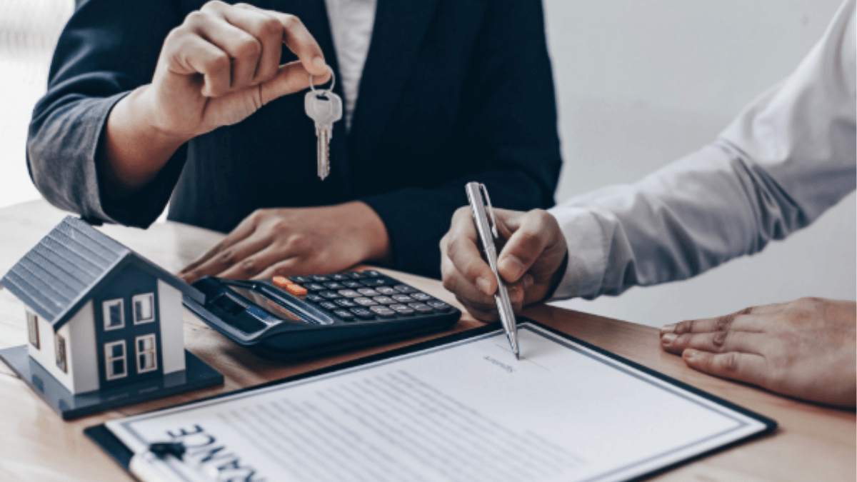 Dallas homebuyer signing a real estate contract while an agent holds the keys, illustrating that the highest offer does not always win