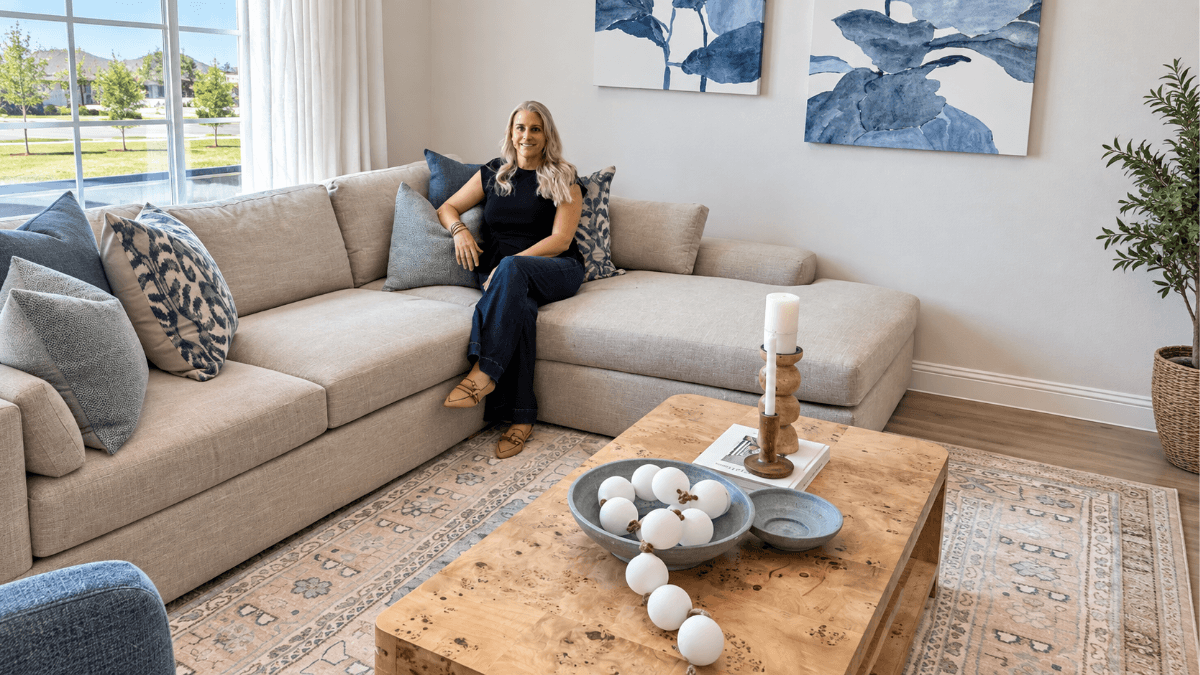 Kelly Reber seated in a bright North Dallas home, reflecting on the neighborhoods, clients, architecture and community that make living and working in North Dallas meaningful