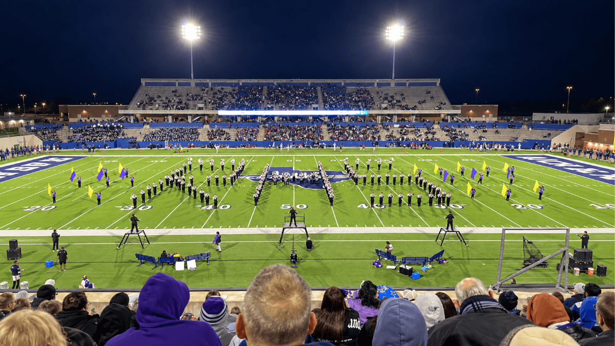 Richardson ISD marching band performing at a community event, representing the school district’s partnerships with local businesses, nonprofits and families that strengthen Richardson schools and neighborhoods