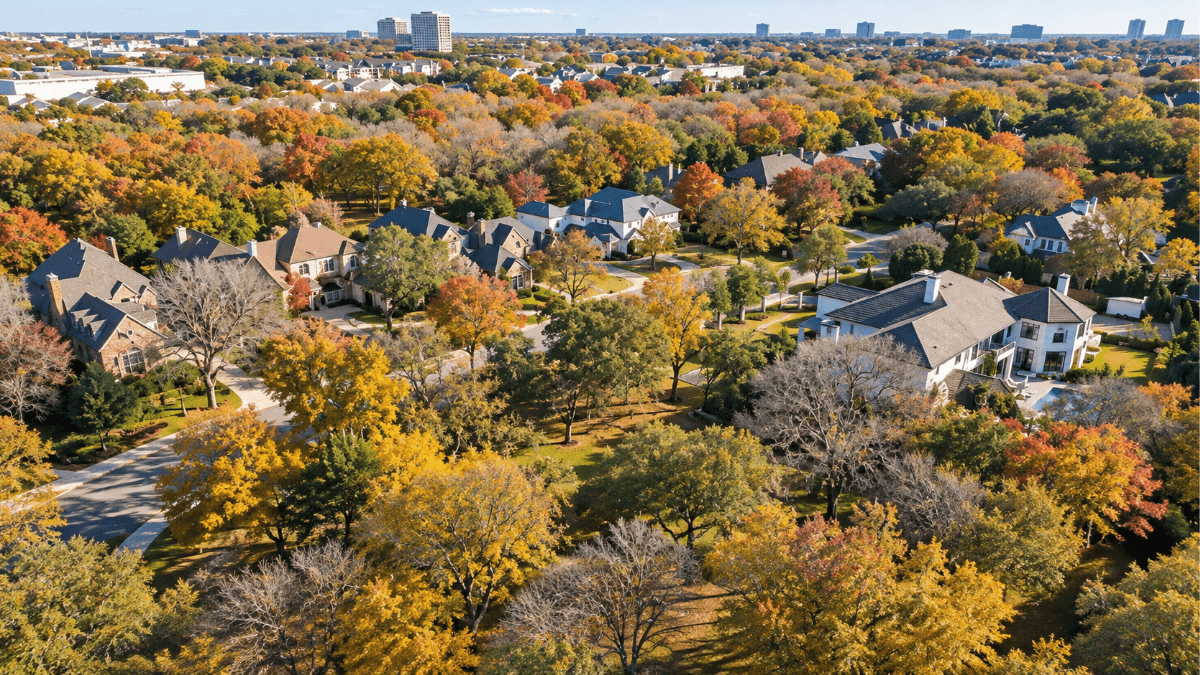 Aerial view of North Dallas neighborhoods with mature trees, established homes and nearby business districts, highlighting the local lifestyle, community character and real estate appeal of Richardson, Plano, Addison and surrounding areas