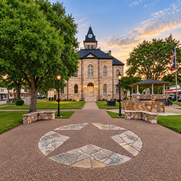 Part 7: Glen Rose, Texas. Historic Somervell County Courthouse and town square in Glen Rose, Texas, featuring mature trees, stone architecture and small-town charm southwest of Dallas.