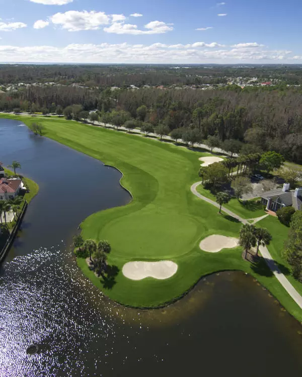 Westchase Golf Course in Tampa FL with lakeside fairways and community homes nearby