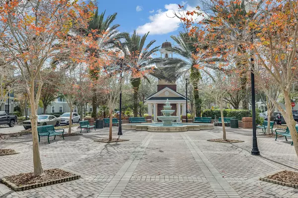 West Park Village fountain in Westchase Tampa FL surrounded by palm trees and community shops