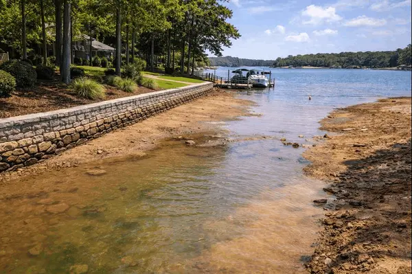 How do Lake Norman’s changing water levels affect waterfront properties?,MICHELE WEAVER
