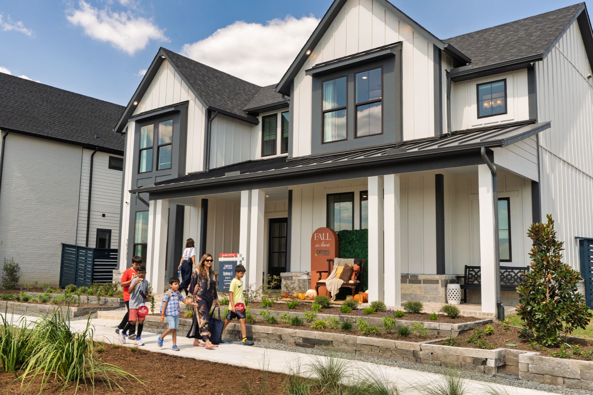 Austin Point master-planned community in Richmond, featuring early-phase home construction, green space, and future amenity areas.