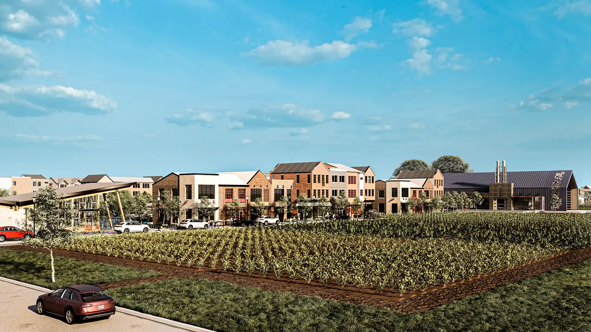 Indigo community entrance in Richmond showcasing walkable streets, community farms, gardens, and early residential development.