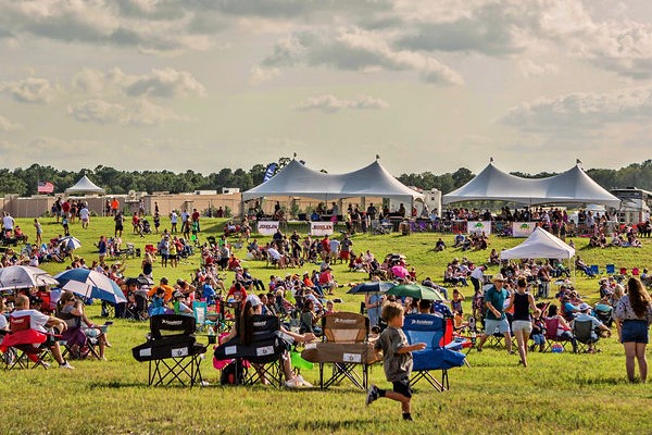 The Hill at Valley Ranch is a 14-acre multi-purpose live event space located in the Valley Ranch Entertainment District at the site of the future planned amphiteater. 