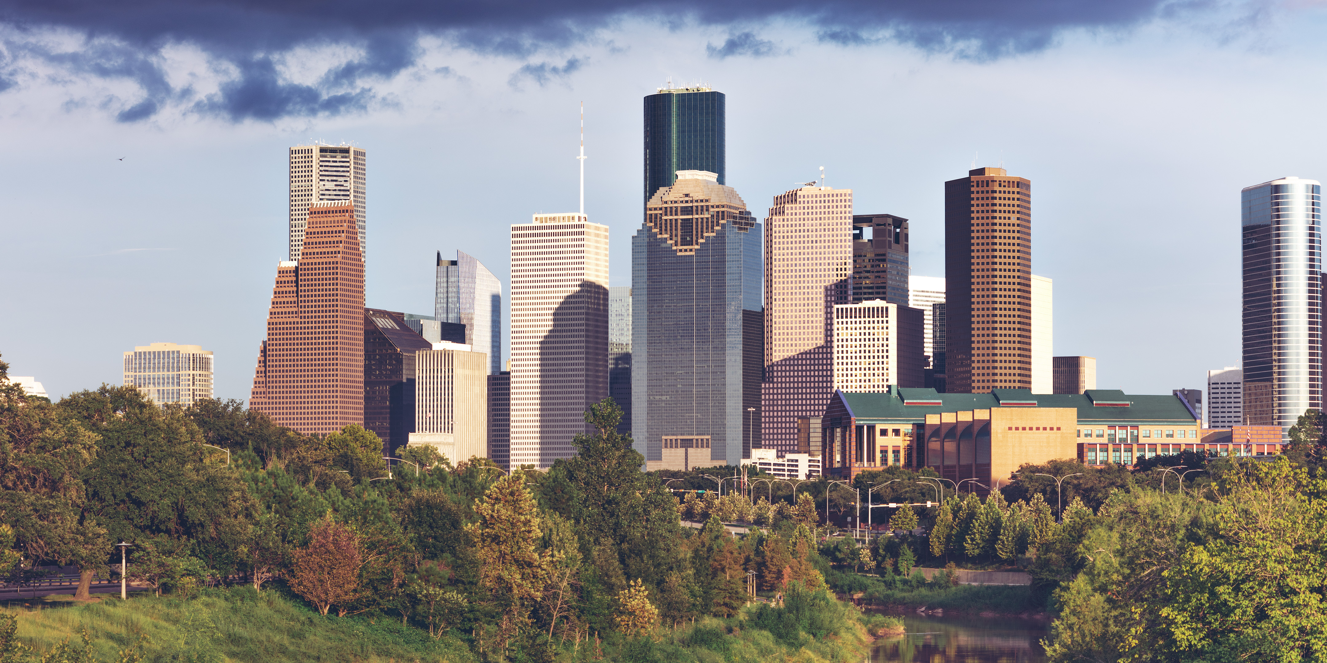 Downtown Houston skyline with modern skyscrapers and urban cityscape at sunset.&rdquo;