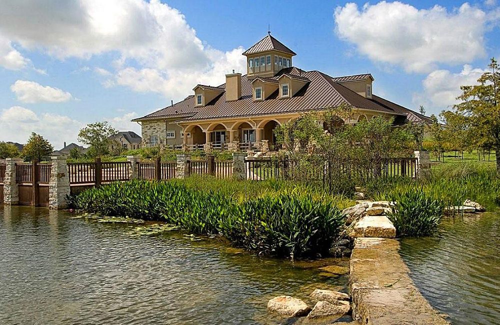 Firethorne community entrance and trees in Katy, TX