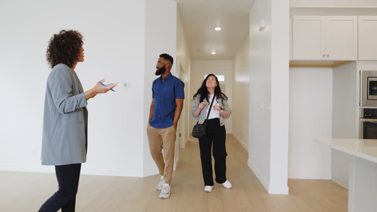 Realtor giving a buyer tour in a Texas home showing