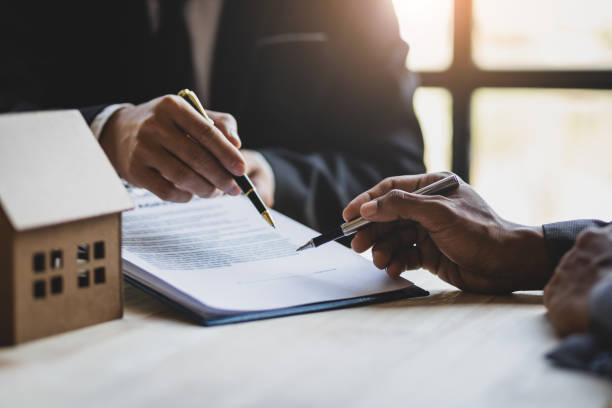Texas homeowners signing paperwork on closing day