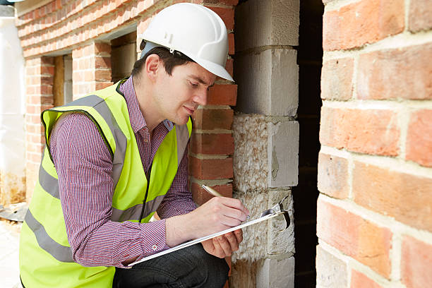 Home inspector evaluating interior and exterior during option period