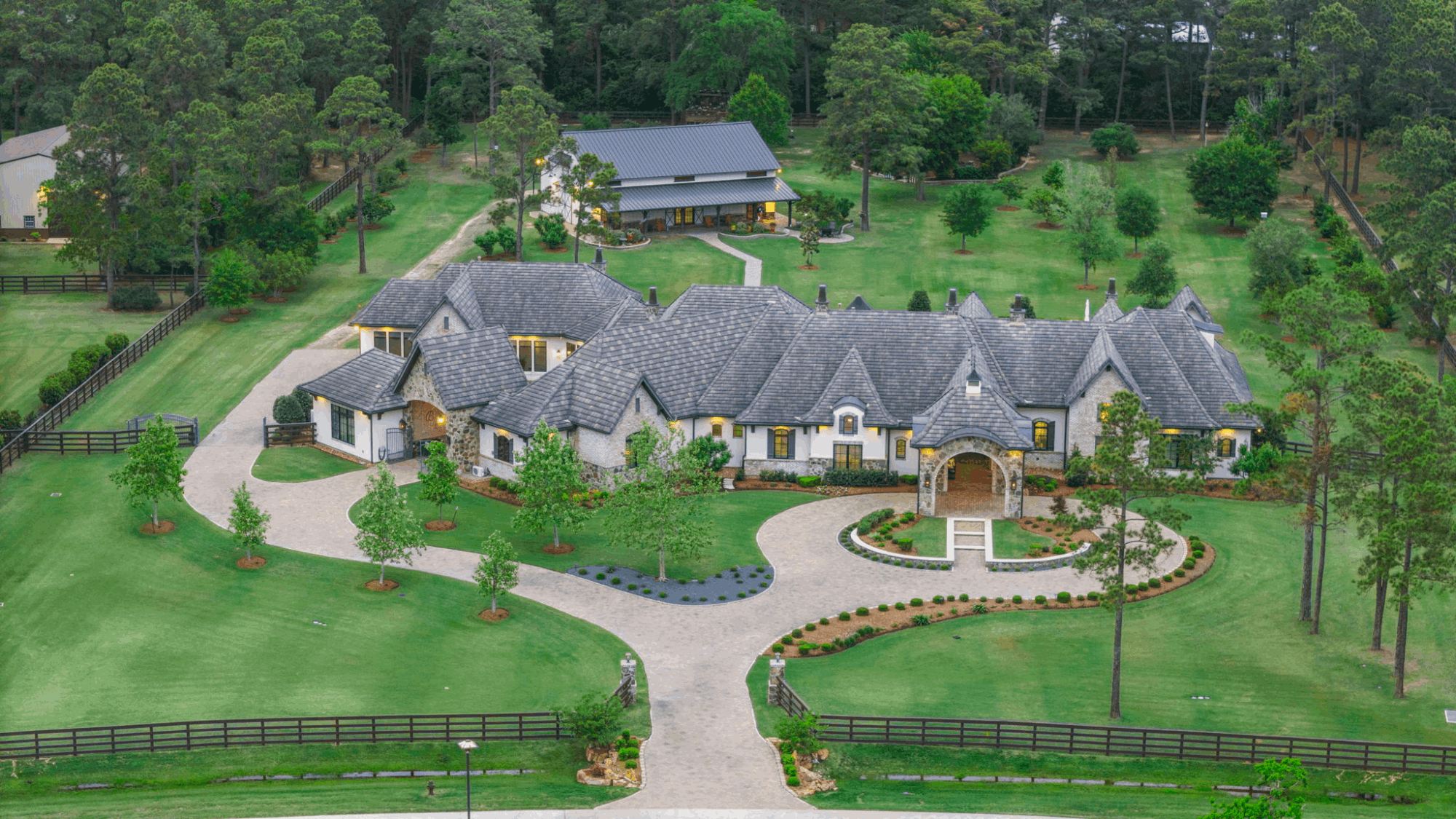 Luxury acreage home in Tomball TX located in Willowcreek Ranch with nearly six acres, private setting, and estate-style design near Houston
