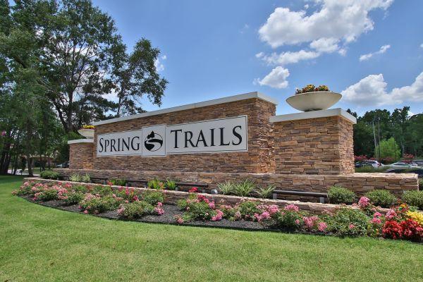 Spring Trails neighborhood in Spring TX with tree-lined streets, parks, and affordable homes