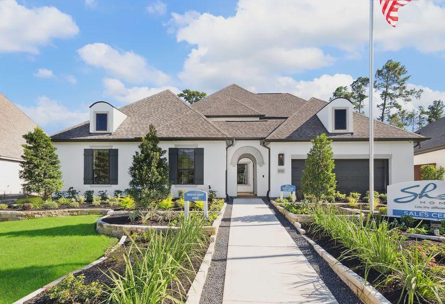 Entrance and new homes in Evergreen, a growing master-planned community in Conroe, Texas.