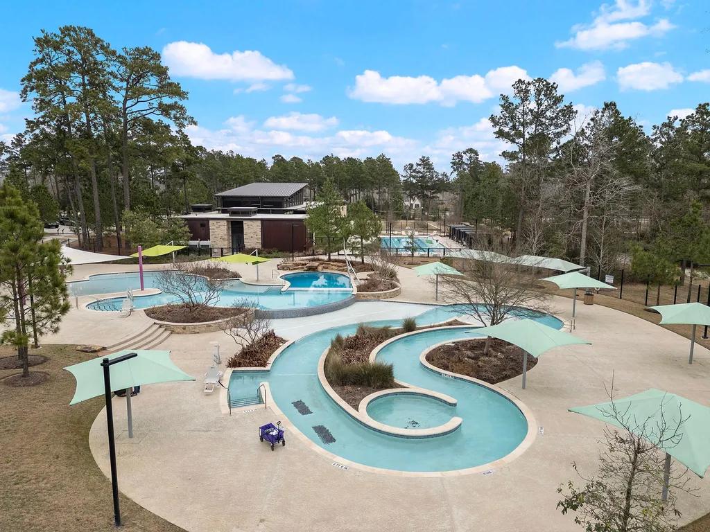 Resort-style amenities and trails in The Woodlands Hills near Conroe, Texas.