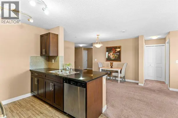 7202, 403 Mackenzie Way SW, Airdrie, AB T4B3V7