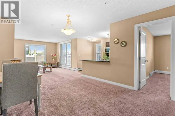 7202, 403 Mackenzie Way SW, Airdrie, AB T4B3V7