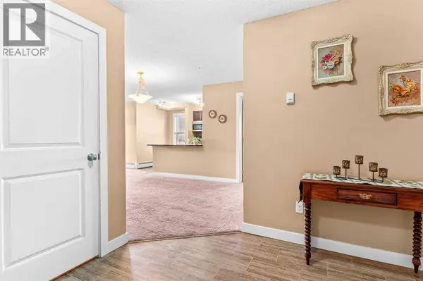 7202, 403 Mackenzie Way SW, Airdrie, AB T4B3V7