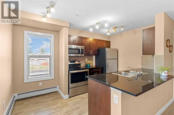 7202, 403 Mackenzie Way SW, Airdrie, AB T4B3V7