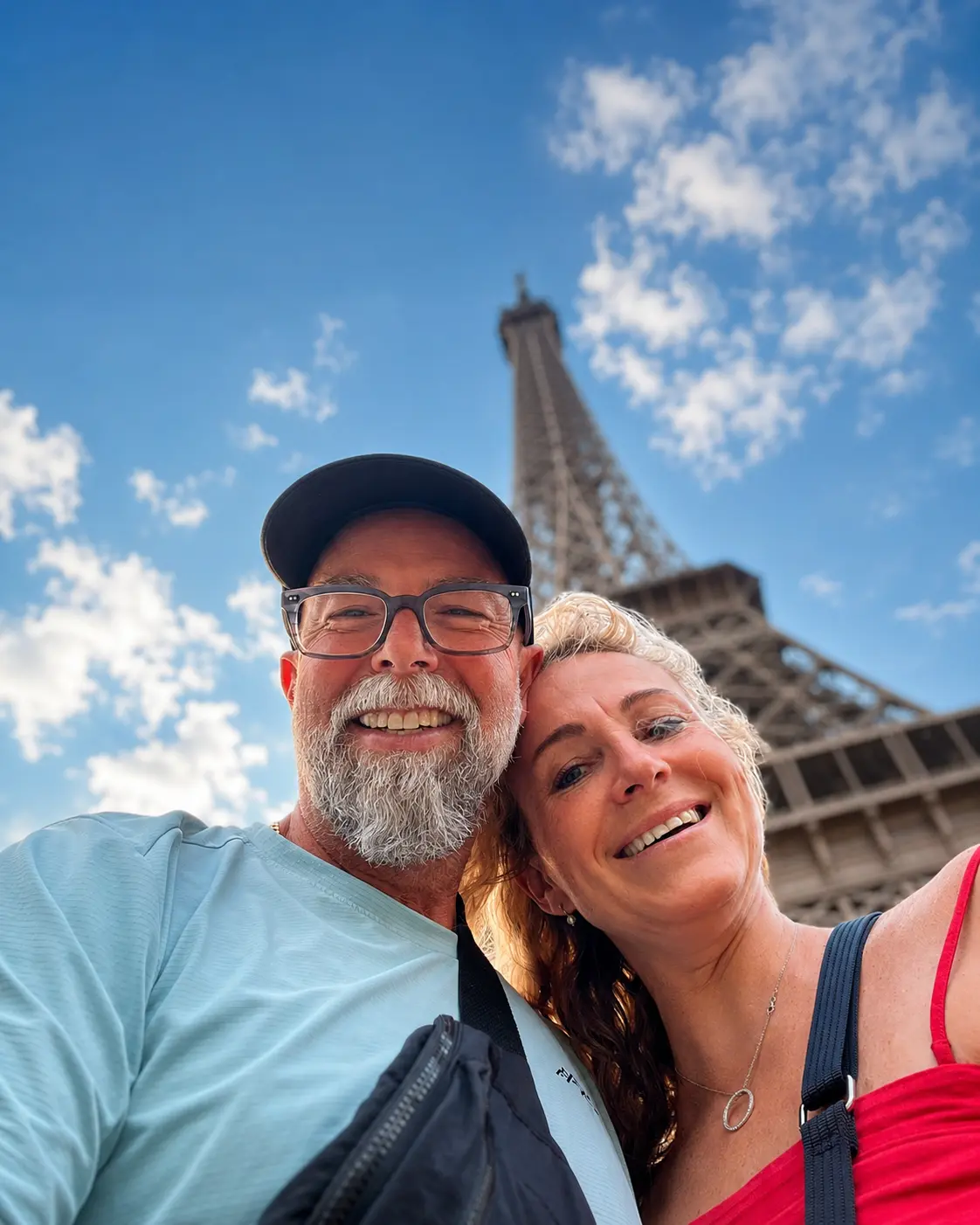 Grace Simon and her husband at the Eiffel Tower in Paris during their European travels