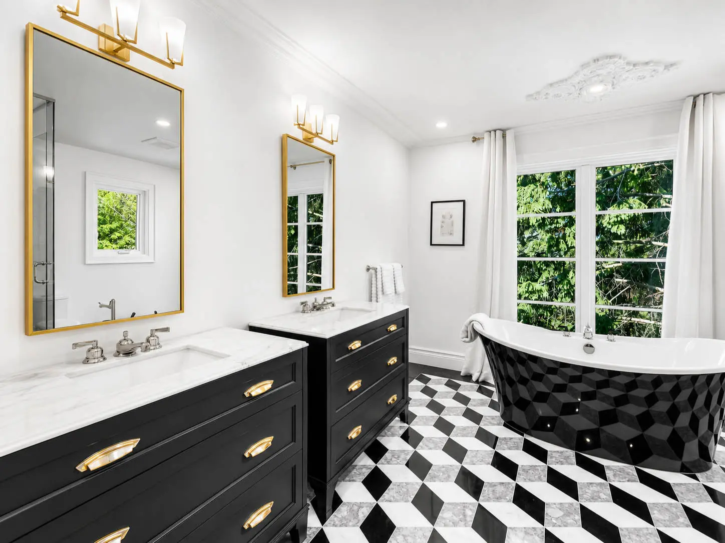 Primary ensuite with dual vanities and black freestanding tub at 816 Norwick Road