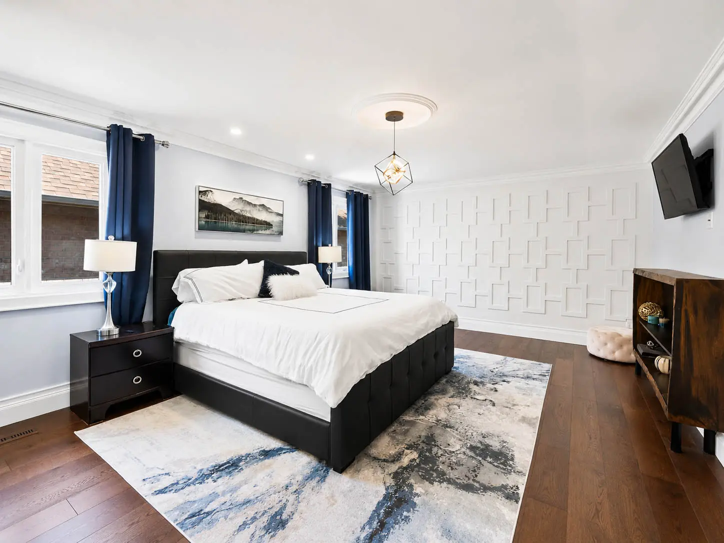 Primary bedroom with custom feature wall at 816 Norwick Road in Newmarket